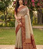 Beige cotton-silk blend saree with contrast maroon zari border