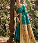 Teal banarasi silk blend saree with peacock paithani border