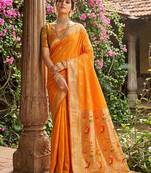 Orange banarasi silk blend saree with peacock paithani border