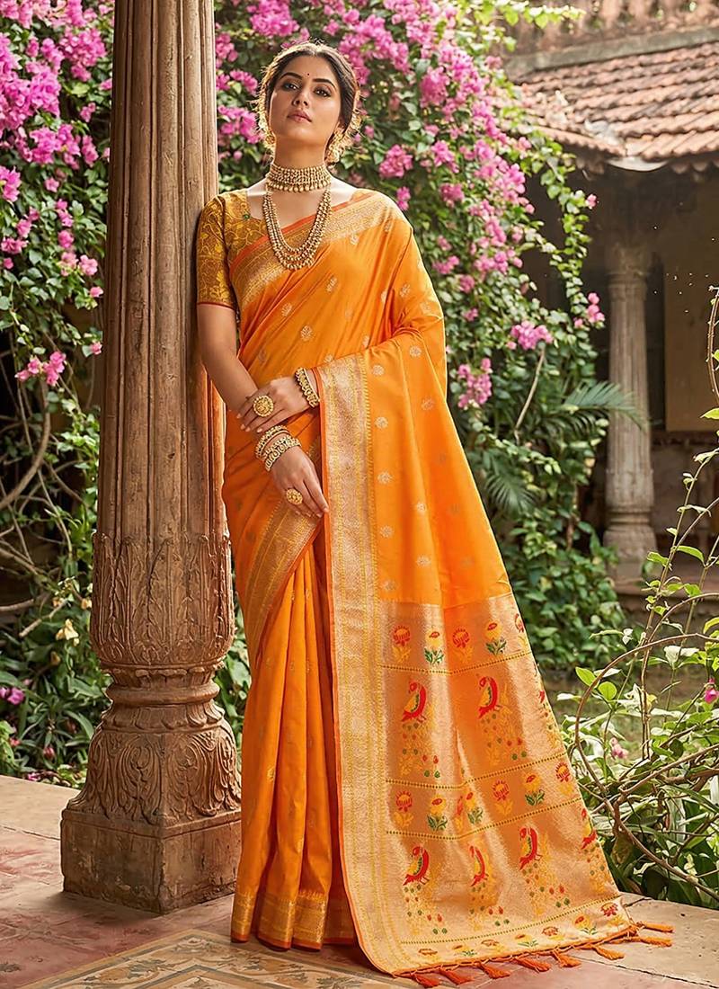 Orange banarasi silk blend saree with peacock paithani border