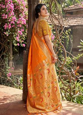 Orange banarasi silk blend saree with peacock paithani border 2