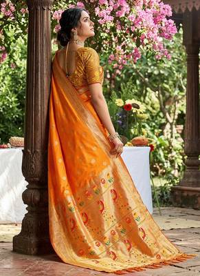Orange banarasi silk blend saree with peacock paithani border 3