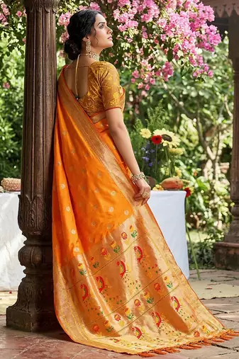 Orange banarasi silk blend saree with peacock paithani border