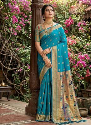 Aqua blue banarasi silk blend saree with peacock paithani border 1