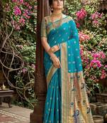 Aqua blue banarasi silk blend saree with peacock paithani border