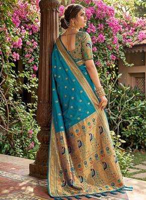 Aqua blue banarasi silk blend saree with peacock paithani border 2