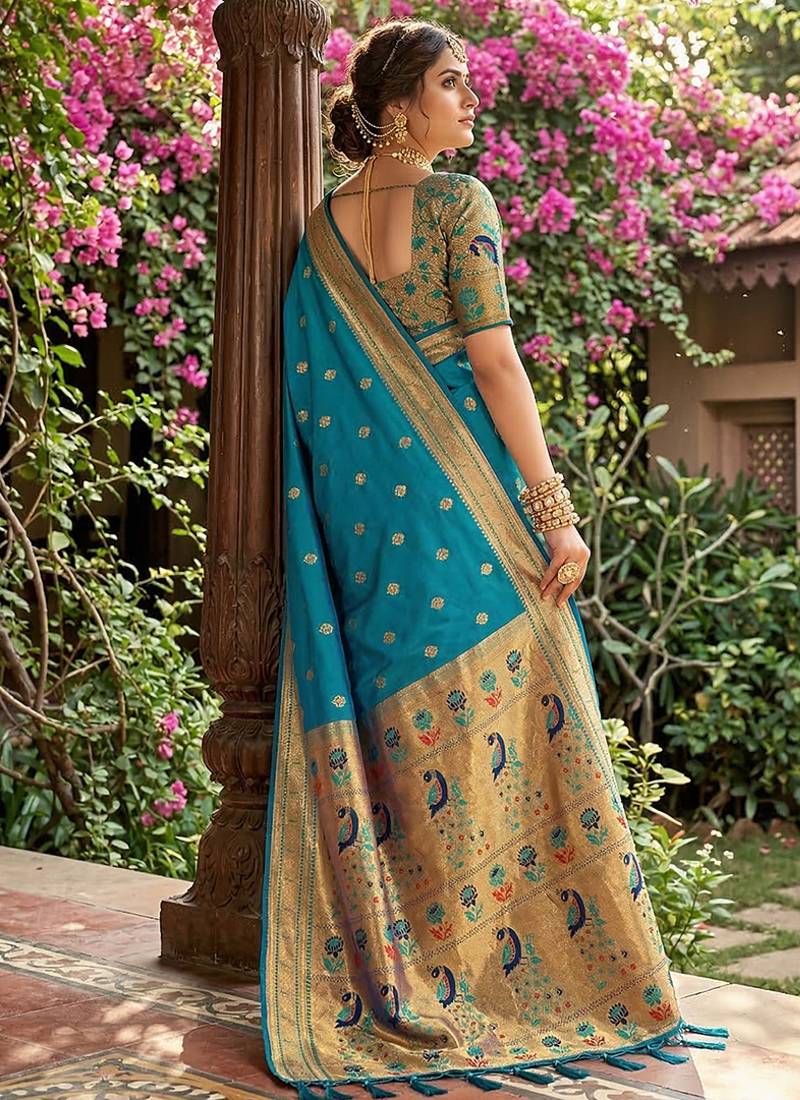 Aqua blue banarasi silk blend saree with peacock paithani border