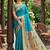 Aqua blue banarasi silk blend saree with peacock paithani border
