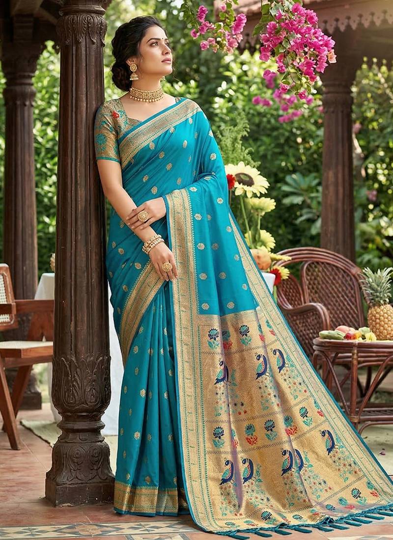 Aqua blue banarasi silk blend saree with peacock paithani border