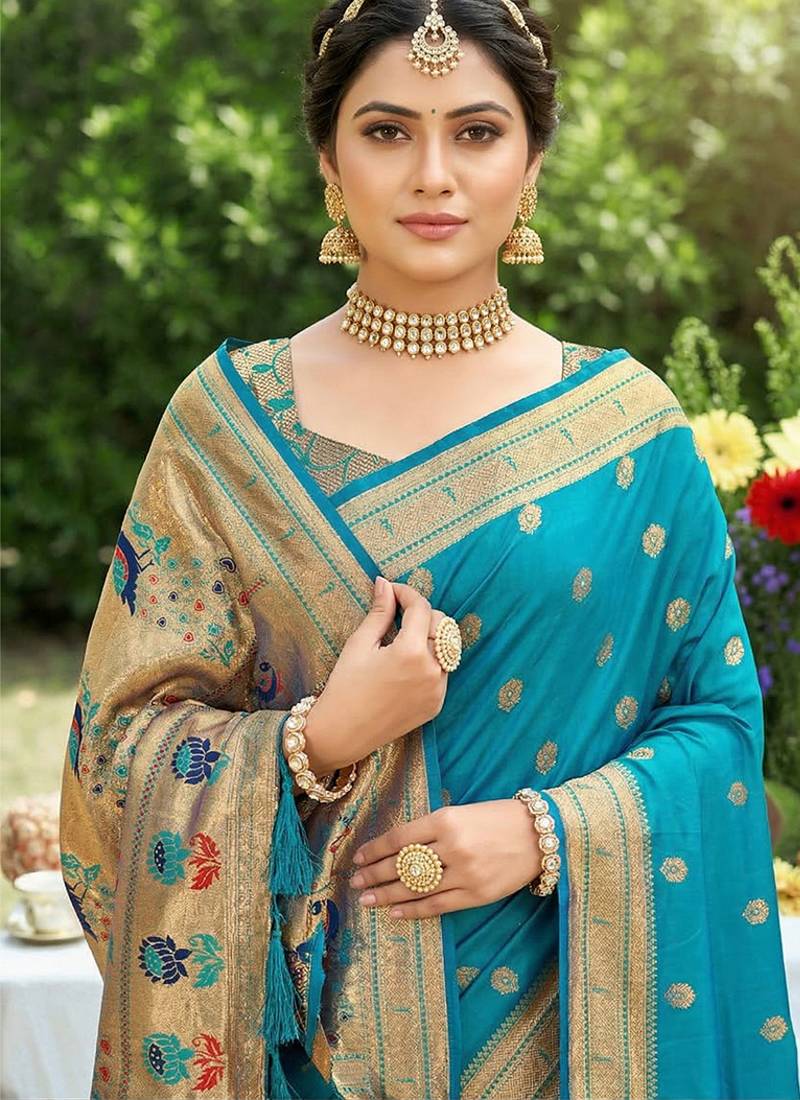 Aqua blue banarasi silk blend saree with peacock paithani border