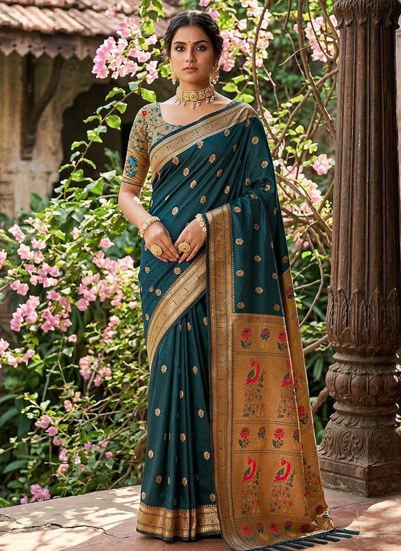 Dark teal banarasi silk blend saree with peacock paithani border