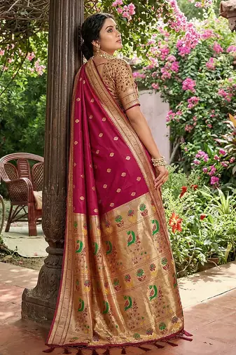 Dark magenta banarasi silk blend saree with peacock paithani border