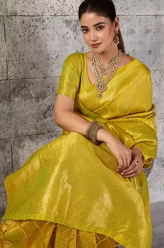 Mustard yellow kanjivaram silk blend zari woven saree with unstiched blouse