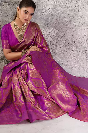 Magenta kanjivaram silk blend zari woven saree with unstiched blouse