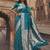 Teal blue banarasi silk saree with gold zari floral meenakari work
