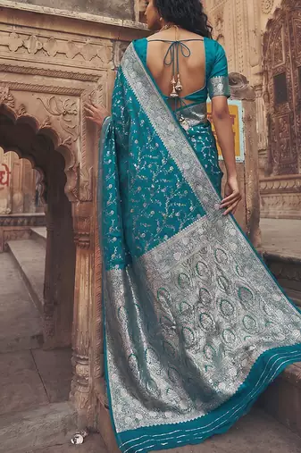 Teal blue banarasi silk saree with gold zari floral meenakari work