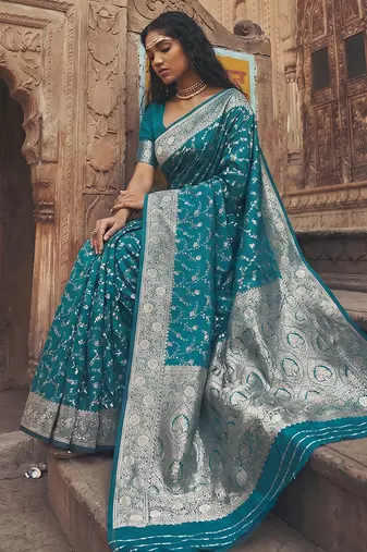 Teal blue banarasi silk saree with gold zari floral meenakari work