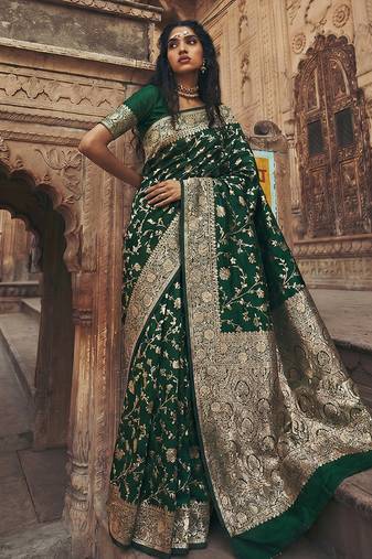 Dark green banarasi silk saree with gold zari floral meenakari work