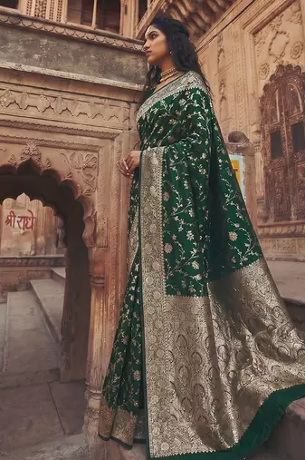 Dark green banarasi silk saree with gold zari floral meenakari work