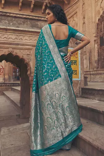 Teal banarasi silk saree with gold zari floral meenakari work