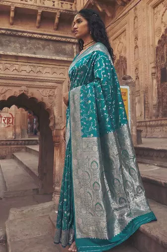 Teal banarasi silk saree with gold zari floral meenakari work