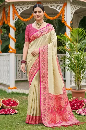 Cream banarasi silk blend saree with rani pink zari woven border