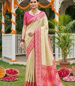 Cream banarasi silk blend saree with rani pink zari woven border