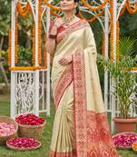 Cream banarasi silk blend saree with red zari woven border