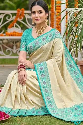 Cream banarasi silk blend saree with aqua blue zari woven border
