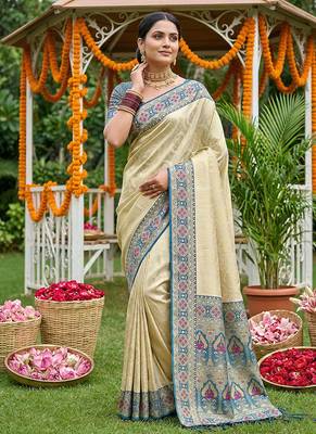 Cream banarasi silk blend saree with blue zari woven border 1