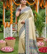 Cream banarasi silk blend saree with blue zari woven border