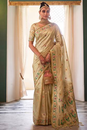 Cream tissue silk blend saree with paithani border and floral pallu