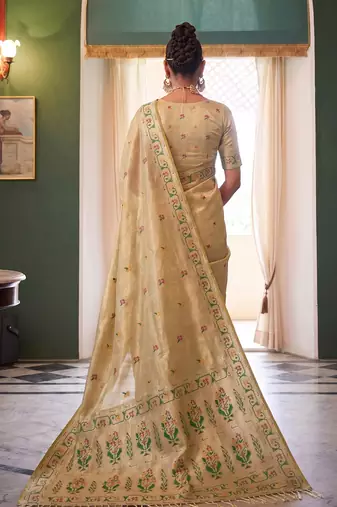 Cream tissue silk blend saree with paithani border and floral pallu