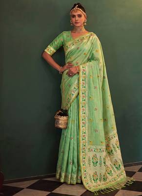 Light green tissue silk blend saree with paithani border and floral pallu 1