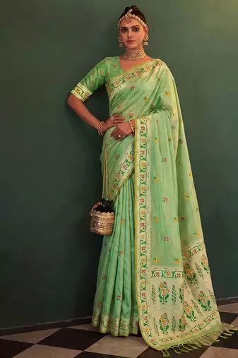 Light green tissue silk blend saree with paithani border and floral pallu