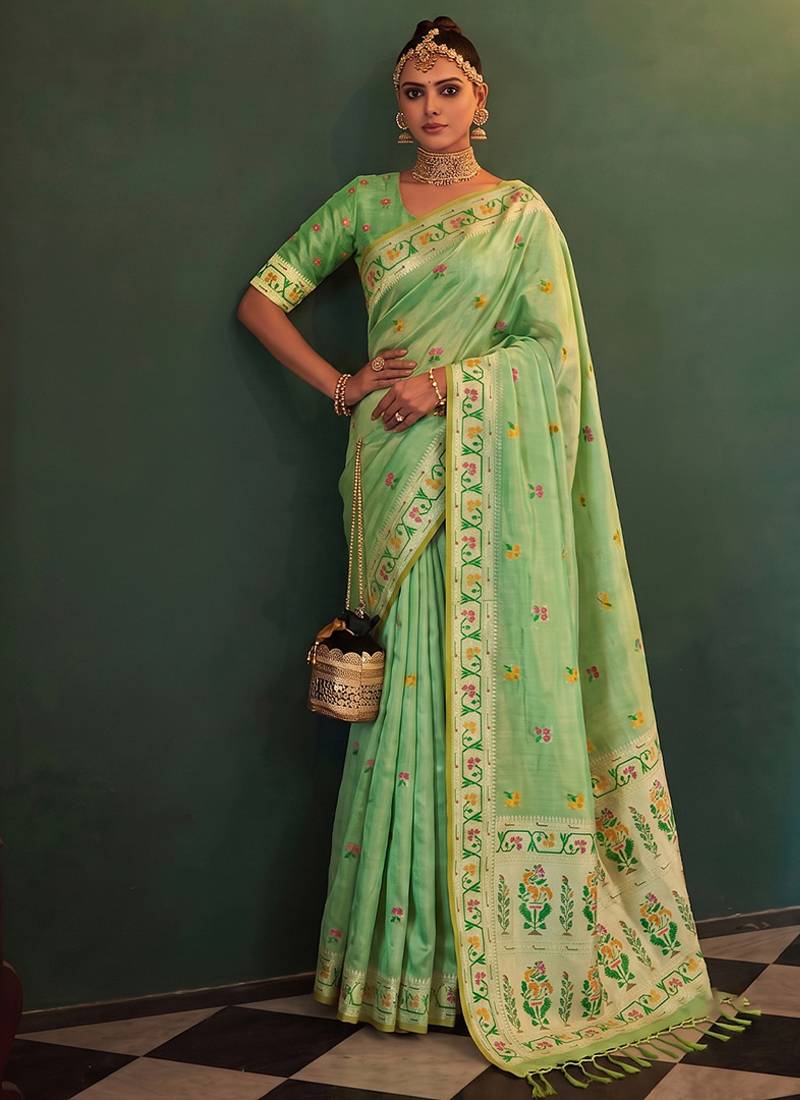 Light green tissue silk blend saree with paithani border and floral pallu