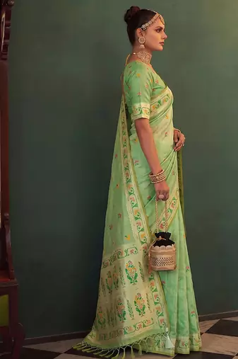 Light green tissue silk blend saree with paithani border and floral pallu