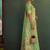 Light green tissue silk blend saree with paithani border and floral pallu