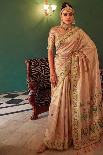 Peach tissue silk blend saree with paithani border and floral pallu