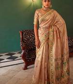 Peach tissue silk blend saree with paithani border and floral pallu