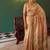 Peach tissue silk blend saree with paithani border and floral pallu