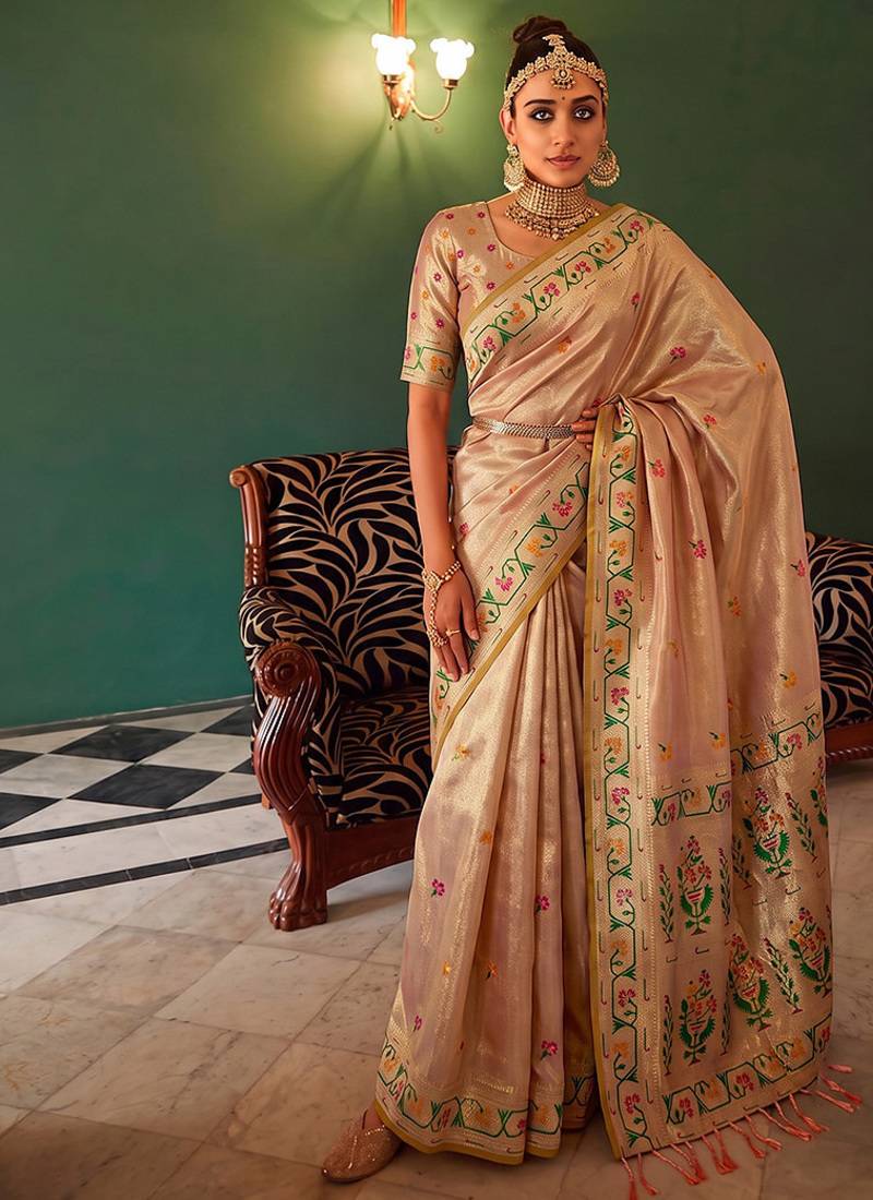 Peach tissue silk blend saree with paithani border and floral pallu