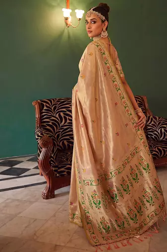 Peach tissue silk blend saree with paithani border and floral pallu