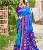 Sky blue & purple paithani silk blend saree with woven border