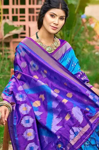 Sky blue & purple paithani silk blend saree with woven border