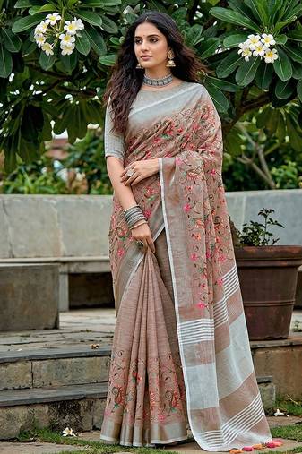 Brown linen cotton blend saree with floral embroidery & tassel pallu
