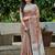 Brown linen cotton blend saree with floral embroidery & tassel pallu