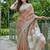 Brown linen cotton blend saree with floral embroidery & tassel pallu