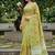 Pista green linen cotton blend saree with floral embroidery & tassel pallu