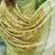 Pista green linen cotton blend saree with floral embroidery & tassel pallu